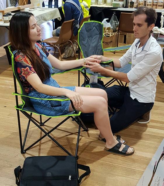 Gav performing acupressure therapy