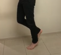 Person demonstrating a balance pose, inspired by principles of TCM.