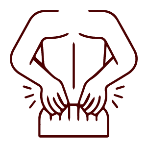 Outline of a person receiving a TCM back massage, hands pressing on the lower back.